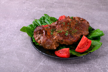 Roasted pork neck served with vegetables. Hot meat meal with spices - 771508006
