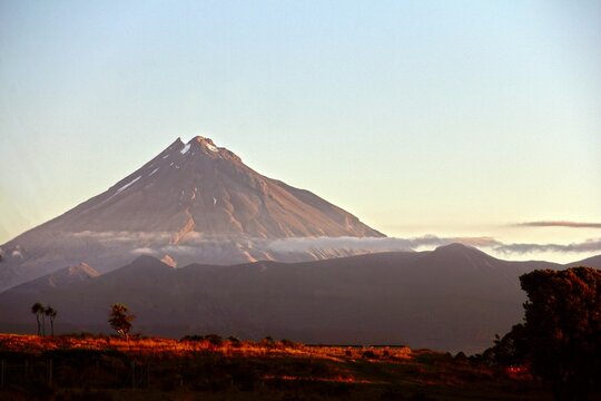 View of Mount Taranaki at sunset. New Zealand.