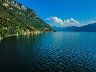 Breathtaking view of Lake Como with majestic mountains in the backdrop, Italy.