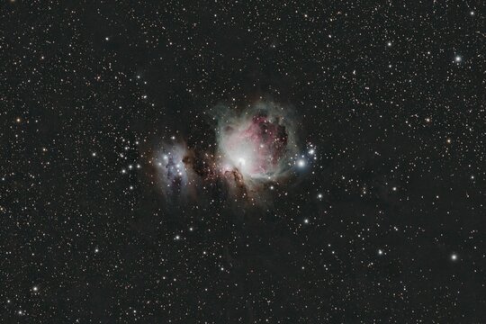 Orion Nebula, located underneath the renowned Orion's Belt constellation in the night sky