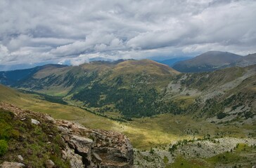 there are no people in the mountains looking at the valley