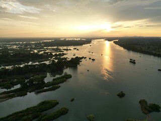 Aerial view of a picturesque sunset sky over the Mekong River in Laos