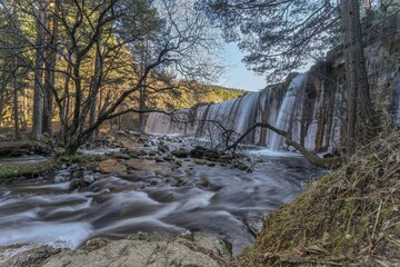 Waterfall of the Lozoya river, Pradillo reservoir in Madrid, Rascafria, Spain