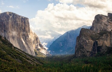 Scenic view of a valley surrounded by majestic mountain peaks in Yosemite National Park