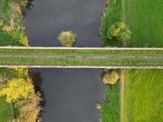 View of a beautiful viaduct spanning a small river in a rural landscape