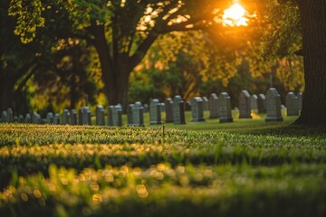 Sunset illuminates a peaceful cemetery, casting a warm glow over the headstones.