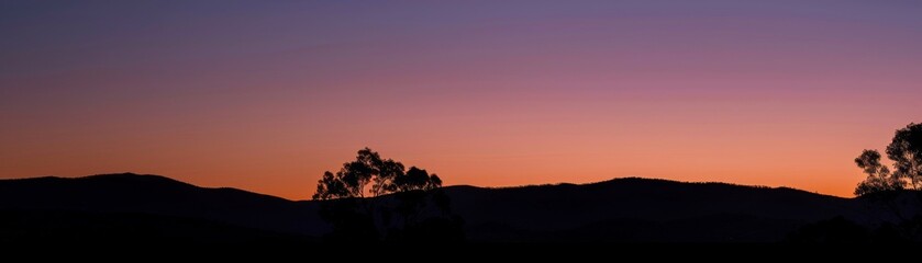 Obraz premium The transition from twilight to night, capturing the last light fading into darkness no dust