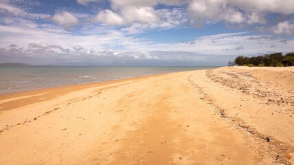Fototapeta na wymiar Sandy beach at West Point on Magnetic Island near Townsville in Far North Queensland, Australia