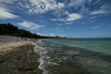Fototapeta na wymiar Scenic view of the rocky beach on a sunny day