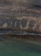 SOS on a Volcanic Beach: Canary Islands