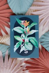 Bright and vibrant wall hanging featuring green and red floral and foliage accents