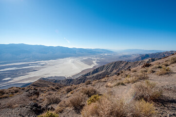 Dante’s view and Badwater Basin in Death Valley. Death Valley National Park in Inyo County of Mojave Desert, California is the hottest place on earth with a temperature of 56,7 °C recorded in 1913. - 771542229
