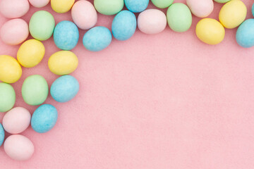 Easter egg background on pink felt - 771542424