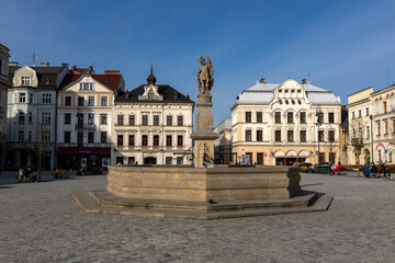 Fototapeta na wymiar Cieszyn's market square and St. Florian's Fountain on a sunny day