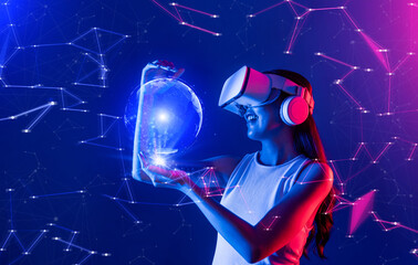 Female stand in cyberpunk neon light wear white VR headset and tank top connecting metaverse, future cyberspace community technology, She holding and see 3D hologram of global picture. Hallucination.