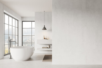 Fototapeta na wymiar Luxury hotel bathroom interior with bathtub near panoramic window. Mockup wall