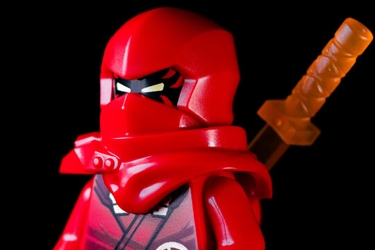 LEGO Ninjago series. Face of Ninja Kai in red suit with sword