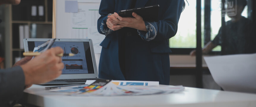 Close up ux developer and ui designer use augmented reality brainstorming about mobile app interface wireframe design on desk at modern office.Creative digital development agency