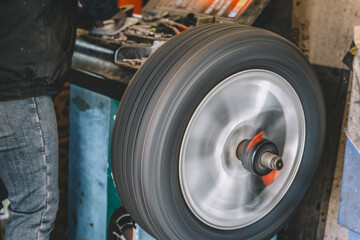 Precision Wheel Balancing in Expert Auto Shop - 771578011