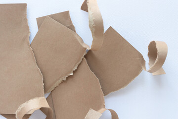 brown paper with torn edge arranged in layered 3d form
