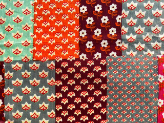 Multi colored block printed  floral design on cotton fabric