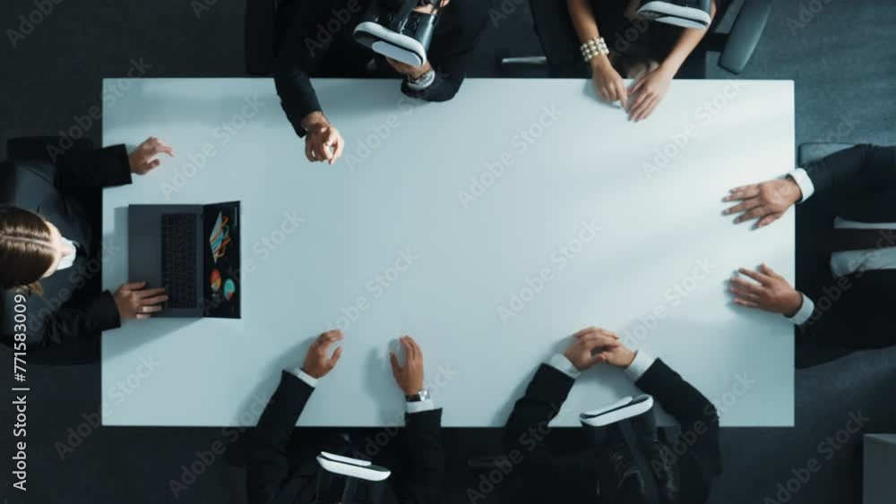 Poster top down aerial view of professional business team wear vr headset to enter virtual world while sitt