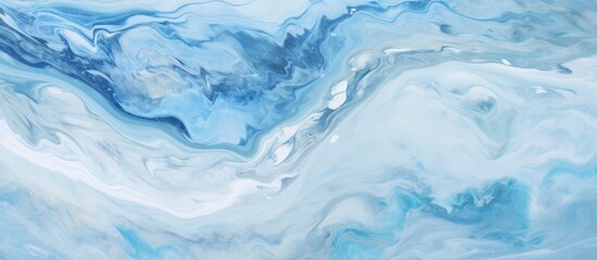 Closeup view of a swirling blue and white marble pattern resembling fluid water waves or electric...