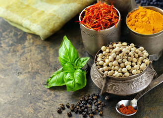 various types of spices on wooden background