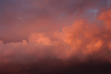 Fototapeta na wymiar Pink beautiful clouds in the evening