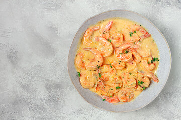 shrimp in creamy garlic sauce, with spices and herbs,
