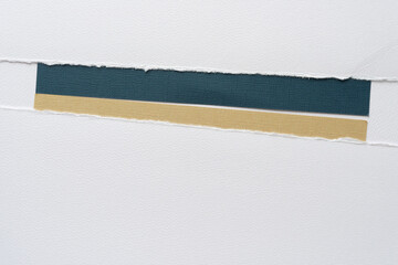 torn paper edge and thin dark blue and beige paper stripes