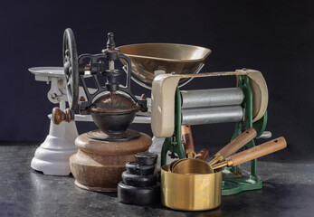 
Antique collection has Pasta maker with hand crank, Original coffee grinder metal shake wheel with...