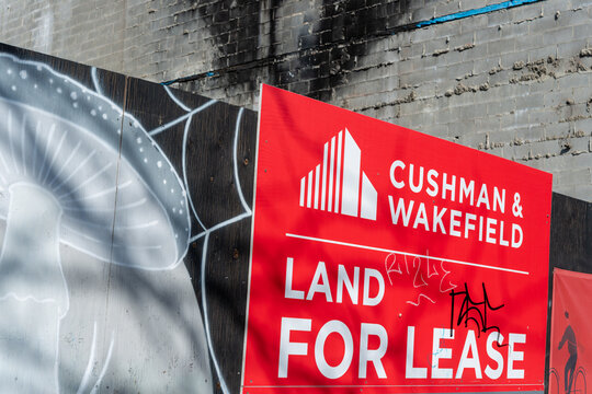 Cushman & Wakefield land for lease sign located at 2760 Dundas Street West in Toronto, Canada
