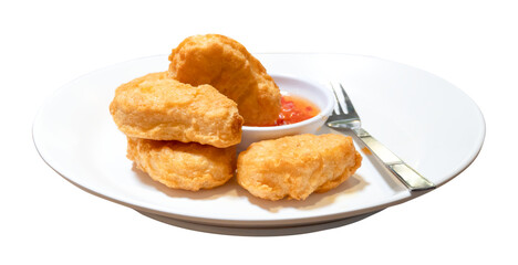 Front view of chicken nuggets with chili sauce in white plate isolated with clipping path in png file format