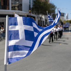 Greek flag on the street during Greek Independence Day parade in Cyprus