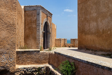 View of the historic walls of the fortress of El Jadida (Mazagan). The fortified city, built by the Portuguese at the beginning of the 16th century and named Mazagan. Morocco, Africa.