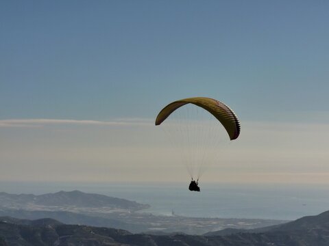 	
Tandem paraglider flying from Otivar, Spain	