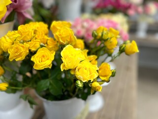 Naklejka na ściany i meble bouquet of yellow tulips in a vase