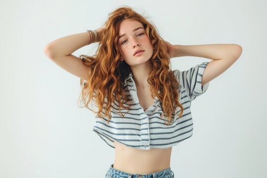 Pretty Young Woman in Striped Button-Up Shirt and Denim Shorts photo on white isolated background
