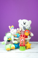 Collection of colorful toys on a purple background. Kids toys.