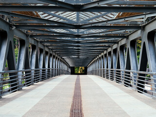 pedestrian bridge with metal structure in the city
