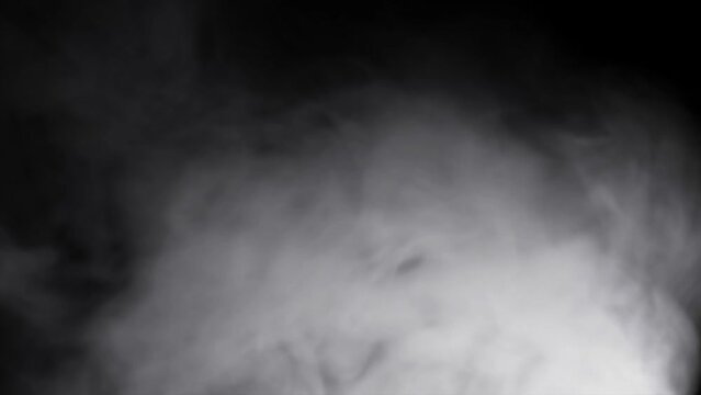 background of white smoke in the dark