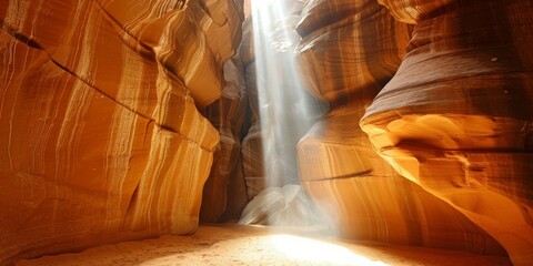 A cave with a light shining through it