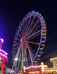 Ferris wheel at night in an amusement park