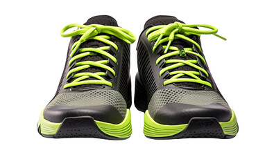 A pair of shoes with neon green laces shining brightly against a dark background