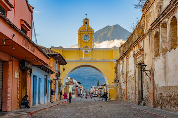 The Santa Catalina Arch in Antigua, Guatemala with Volcan de Agua in the background.