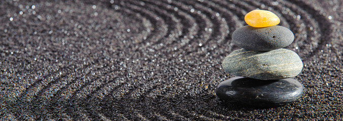  Japanese zen garden with stone in textured sand