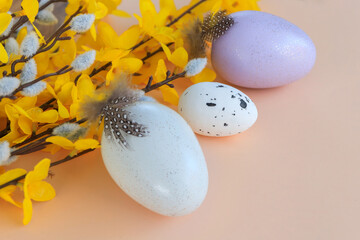Composition of flowers and Easter eggs on a pastel background - 771691256