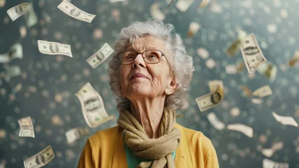 Foto op Canvas Elderly woman with falling money backdrop - An elderly lady looks up with a hopeful expression as cash notes rain down around her, symbolizing wealth or retirement © Mickey