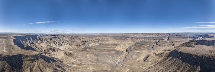 Panoramic drone picture of the Fish River Canyon in Namibia taken from the upper edge of the south...